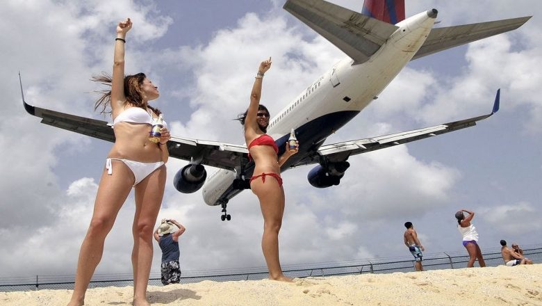 Saint Maarten low pass planes and bikini girls